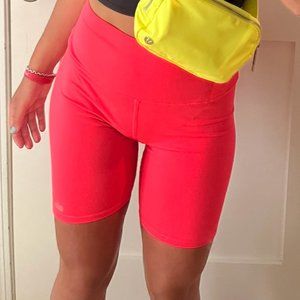 7 inch ALO biker shorts (coral/pink color)